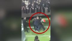 super-bowl-dancer-waving-sudan-palestine-flag-gets-tackled