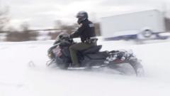 police-ride-snowmobiles-as-snowstorm-hits-north-america