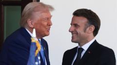 watch:-trump-and-macron-shake-hands-–-and-wish-pope-francis-well