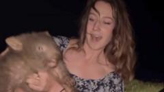 sam-jones-wombat:-us-influencer-draws-backlash-for-taking-baby-wombat-from-mum