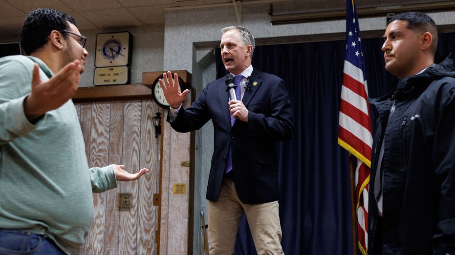 ‘soulless-piece-of-crap’:-angry-protester-jumps-on-stage-during-dem-rep’s-town-hall